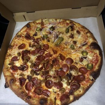 Little Coyote - First look after walking to my car from the restaurant. Custom Pie- half Meat Lover, half Pineapple Express. - Pizza Near Me - Long Beach, California