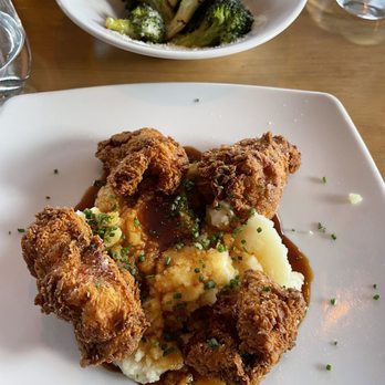 The Kitchen Table - Fried chicken entree. Side of broccoli in the back. - Italian Near Me - San Rafael, California The Kitchen Table - Fried chicken entree. Side of broccoli in the back. - Italian Near Me - San Rafael, California