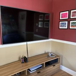 MegaTV Installations - 75" mount unconcealed wiring. Wall is tricky with fireplace and corner behind.
