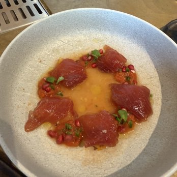 Predalina - yellowfin tuna crudo yellow tomato, espelette, basil, pomegrante, olive oil - Mediterranean Near Me - Tampa, Florida Predalina - yellowfin tuna crudo yellow tomato, espelette, basil, pomegrante, olive oil - Mediterranean Near Me - Tampa, Florida