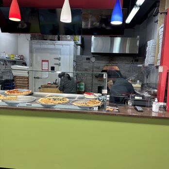 Romilano Pizza - pizza making! - Pizza Near Me - Richmond, British Columbia Romilano Pizza - pizza making! - Pizza Near Me - Richmond, British Columbia