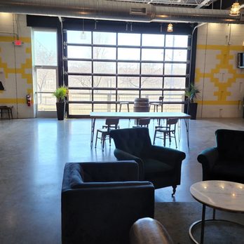 Royal Foundry Craft Spirits - a view of a room with chairs and tables - Distilleries Near Me - Minneapolis, Minnesota