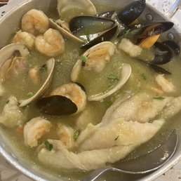 Sole Fish, shrimp, mussels, clams in salsa verde sauce
