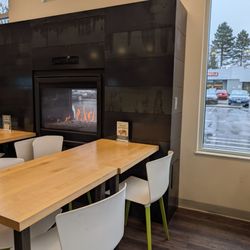 Taco Time - Seating area with fireplace.