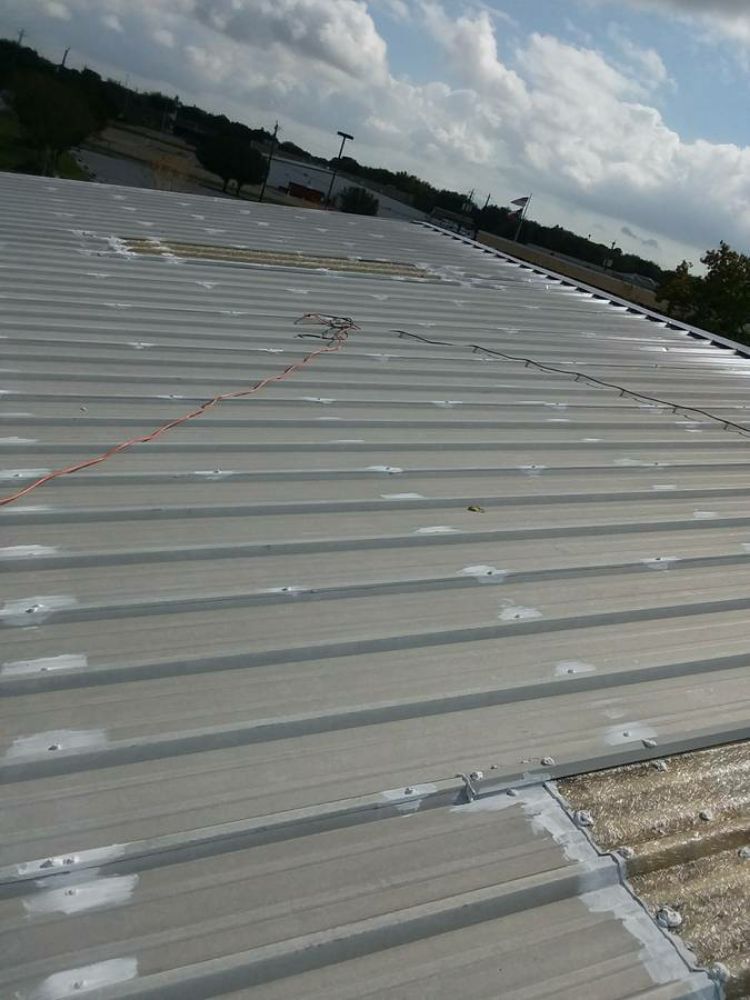 Slide of American Roofing and Paving