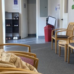Wonderkind Pediatric Therapy - Entrance , restroom, and shoe cubbies.
