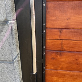 Rock Hard Turf - The gate they put silver and gold screws in the front. They removed them and left it looking like this - Landscape Architects or Designers Near Me