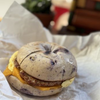 Sweet Bar Bakery - Breakfast blueberry bagel sandwich with sausage scramble and cheddar $7.95 - Bakeries Near Me - Oakland, California Sweet Bar Bakery - Breakfast blueberry bagel sandwich with sausage scramble and cheddar $7.95 - Bakeries Near Me - Oakland, California