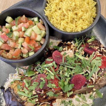 Dizengoff - Charred Eggplant w/cherry agrodolce, dukkah & served w/tomato cucumber salad & rice - Middle Eastern Near Me - Philadelphia, Pennsylvania Dizengoff - Charred Eggplant w/cherry agrodolce, dukkah & served w/tomato cucumber salad & rice - Middle Eastern Near Me - Philadelphia, Pennsylvania