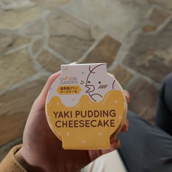 Cheese Garden - a person holding a box of cheesecake - Desserts Near Me - San Diego, California Cheese Garden - a person holding a box of cheesecake - Desserts Near Me - San Diego, California