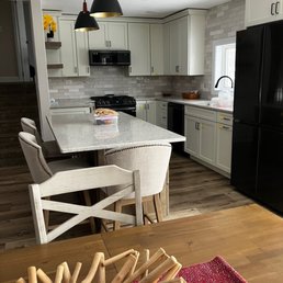 a kitchen and dining room a kitchen and dining room