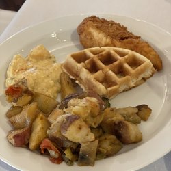 The Lighthouse on the Lake - Breakfast potatoes, chicken and waffles, and shrimp and grits