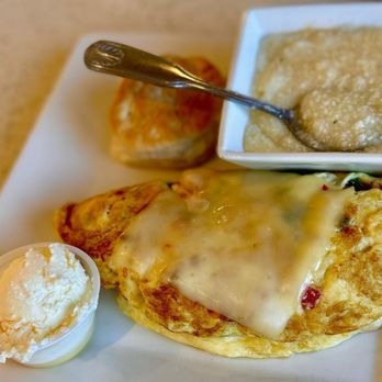 Cracked & Crepe - Egg White Omelet with Spinach & Tomatoes, a side of Grits, and a Biscuit - Breakfast & Brunch Near Me - Frisco, Texas Cracked & Crepe - Egg White Omelet with Spinach & Tomatoes, a side of Grits, and a Biscuit - Breakfast & Brunch Near Me - Frisco, Texas