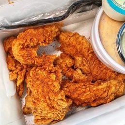 Golden tenders spicy (make sure you order lotta zing sauce to dip it's my favorite thing on the planet ) I'm addicted to golden chick Golden tenders spicy (make sure you order lotta zing sauce to dip it's my favorite thing on the planet ) I'm addicted to golden chick