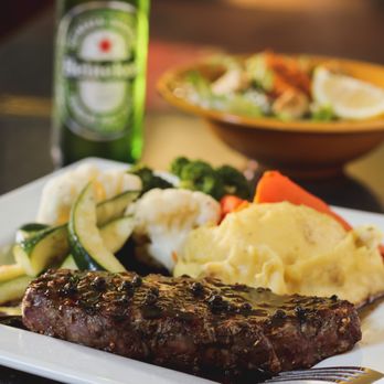 JBI Café Restaurant - Brandy Peppercorn New York Steak 8 oz. AAA New York steak cooked to your liking, accompanied with brandy peppercorn demi-glace. - Cafes Near Me - Victoria, British Columbia JBI Café Restaurant - Brandy Peppercorn New York Steak 8 oz. AAA New York steak cooked to your liking, accompanied with brandy peppercorn demi-glace. - Cafes Near Me - Victoria, British Columbia