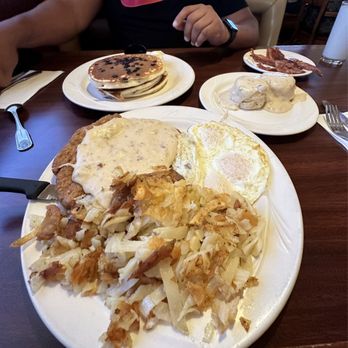 GoodFella's Cafe - Country Fried Steak and Eggs with Hash-browns. A side of biscuits and gravy and delicious blueberry pancakes. - Breakfast & Brunch Near Me - Corona, California