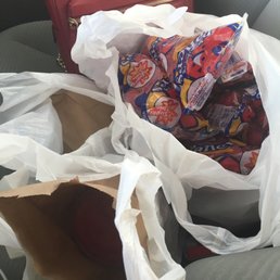a bag of candy and a bag of candy in the back seat of a car