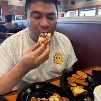Shakey's Pizza Parlor - My happy husband with his special pizza - Pizza Near Me - Buena Park, California