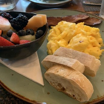 Buffalos - Scrambled egged with bacon, fresh fruit, and a baguette. - American Near Me - Bluffton, South Carolina
