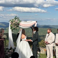 Heartlight Weddings - This couple had their wedding at a beautiful spot with a gorgeous view in the spring of 2026.