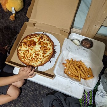 Clyde's Place - a pizza and french fries - Dive Bars Near Me - Carp Lake, Michigan