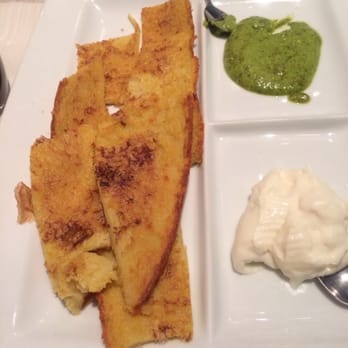 Portivene - Farinata with cheese and pesto spreads - Seafood Near Me - Portovenere, SP Portivene - Farinata with cheese and pesto spreads - Seafood Near Me - Portovenere, SP