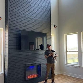 B&F Renovations - a man standing in front of a fireplace - General Contractors Near Me B&F Renovations - a man standing in front of a fireplace - General Contractors Near Me