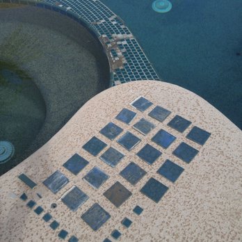 Arizona Elite Properties - Missing/broken tiles on pool. - Real Estate Agents Near Me - Chandler, Arizona