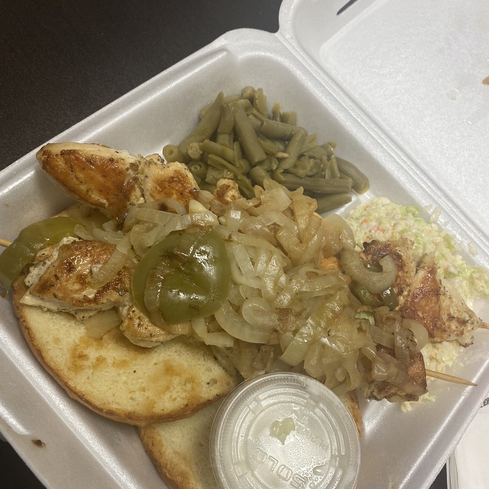 Mediterranean chicken dinner with coleslaw and green beans...over a hamburger bun... Mediterranean chicken dinner with coleslaw and green beans...over a hamburger bun...