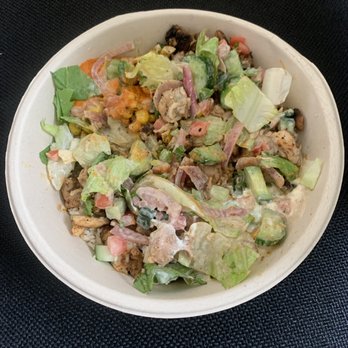 CAVA - 12/4/21 supergreens/rice, chicken, persian cucumber, tomatoes, pickled onions, corn, lettuce, tzatziki, red pepper hummus, tahini caesar - Mediterranean Near Me - Boston, Massachusetts