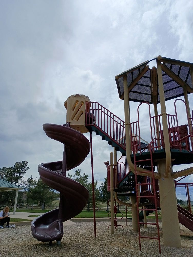 Whispering Pines Park Logo