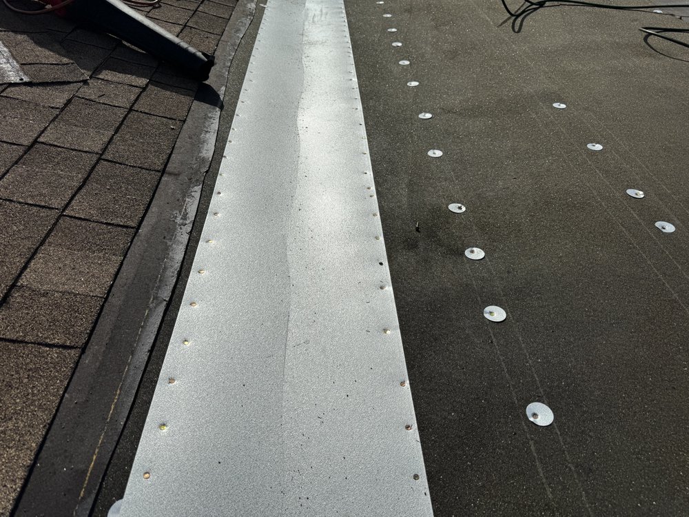 Slide of On Point Roofing