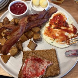 Breakfast plast with eggs over easy Breakfast plast with eggs over easy