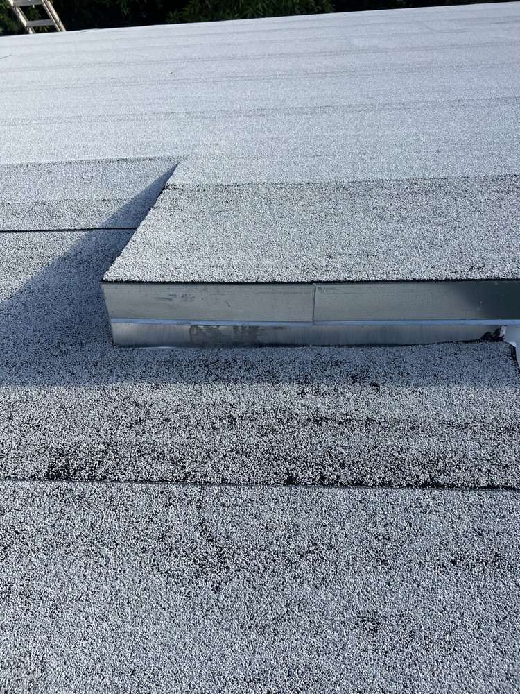 Slide of Johns Roofing Services