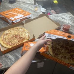 Little Caesars - Sausage pizza, cheese pizza, pepperoni and sausage pizza, crazy bread, and marinara.