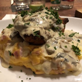The Lotts Café Bar - Chicken stuffed with spinach on top of mashed potatoes with cheese and bacon. So good but heavy! - Pubs Near Me - Dublin, D The Lotts Café Bar - Chicken stuffed with spinach on top of mashed potatoes with cheese and bacon. So good but heavy! - Pubs Near Me - Dublin, D