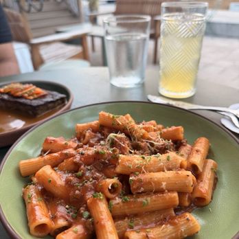 Kaya - FILIPINO RIGATONI ningang's beef bolognese, spam, aged gouda, a touch of sweetness, a lot of love - Filipino Near Me - Orlando, Florida