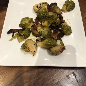Maggie McFly's - Tiny plate of roasted brussel sprouts with burnt bacon. - New American Near Me - Virginia Beach, Virginia Maggie McFly's - Tiny plate of roasted brussel sprouts with burnt bacon. - New American Near Me - Virginia Beach, Virginia
