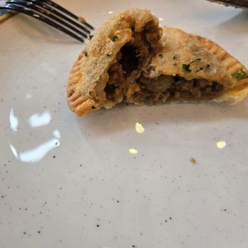 La Famosa - Inside peek of pastelillo - Puerto Rican Near Me - Washington, DC, District of Columbia