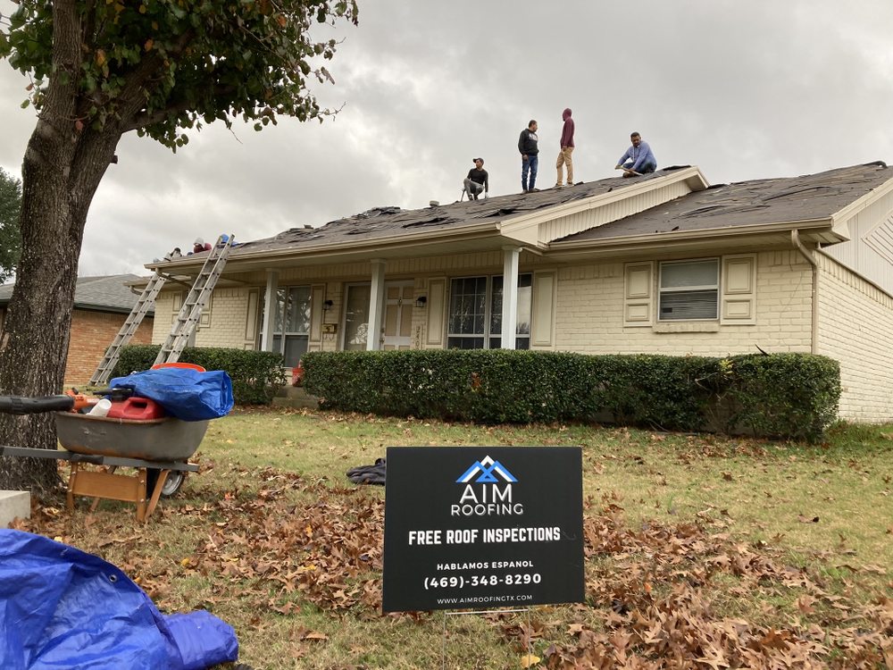 Slide of AIM Roofing