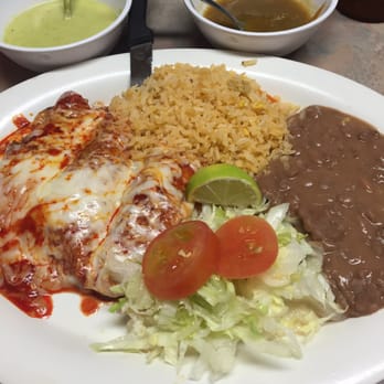 Taqueria Abasolo - One of the Friday specials, enchiladas with rice and beans. - Mexican Near Me - Houston, Texas Taqueria Abasolo - One of the Friday specials, enchiladas with rice and beans. - Mexican Near Me - Houston, Texas