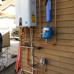 J&J Rooter & Plumbing - New Navien tankless water heater.