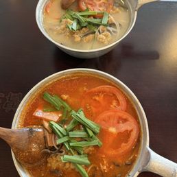 Tomato house special rice noodles & original house special rice noodles, both with crispy pork Tomato house special rice noodles & original house special rice noodles, both with crispy pork