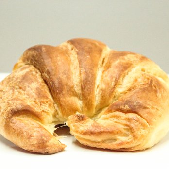 San Pietro - a croissant on a white table - Bakeries Near Me - Montreal, Quebec San Pietro - a croissant on a white table - Bakeries Near Me - Montreal, Quebec