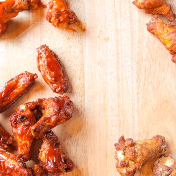 Westside Pizza - chicken wings and buffalo wings on a cutting board - Pizza Near Me - Colfax, Washington Westside Pizza - chicken wings and buffalo wings on a cutting board - Pizza Near Me - Colfax, Washington