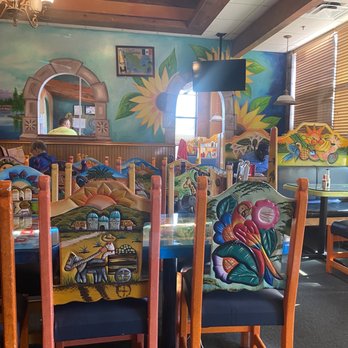 La Pinata - a dining room with a mural on the wall - Mexican Near Me - Cincinnati, Ohio