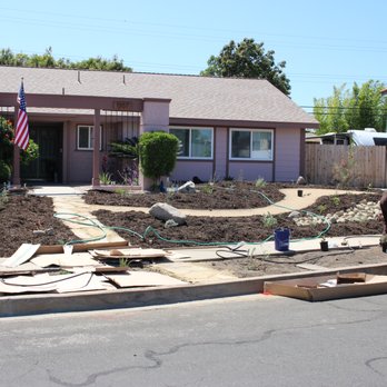 Plant Marks - the front yard of a house being built - Landscaping Near Me Plant Marks - the front yard of a house being built - Landscaping Near Me