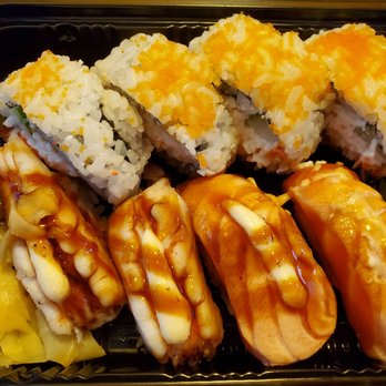 Domo Cafe Kahala - B3 Cali Roll, Garlic Shrimp and Salmon...looks ugly cause fell over in the car - Sushi Bars Near Me - Honolulu, Hawaii Domo Cafe Kahala - B3 Cali Roll, Garlic Shrimp and Salmon...looks ugly cause fell over in the car - Sushi Bars Near Me - Honolulu, Hawaii