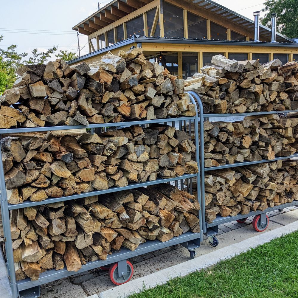 DAS BBQ - Outside. Stacks of wood outside the restaurant that they use to smoke the meats. I believe it's a mixture of hickory and pecan wood. - Barbeque Near Me - Atlanta, Georgia DAS BBQ - Outside. Stacks of wood outside the restaurant that they use to smoke the meats. I believe it's a mixture of hickory and pecan wood. - Barbeque Near Me - Atlanta, Georgia