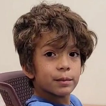 Austin Haircut - How long his hair was when we came in. I asked her to keep length down middle, just trim. - Hair Stylists Near Me - Cedar Park, Texas Austin Haircut - How long his hair was when we came in. I asked her to keep length down middle, just trim. - Hair Stylists Near Me - Cedar Park, Texas